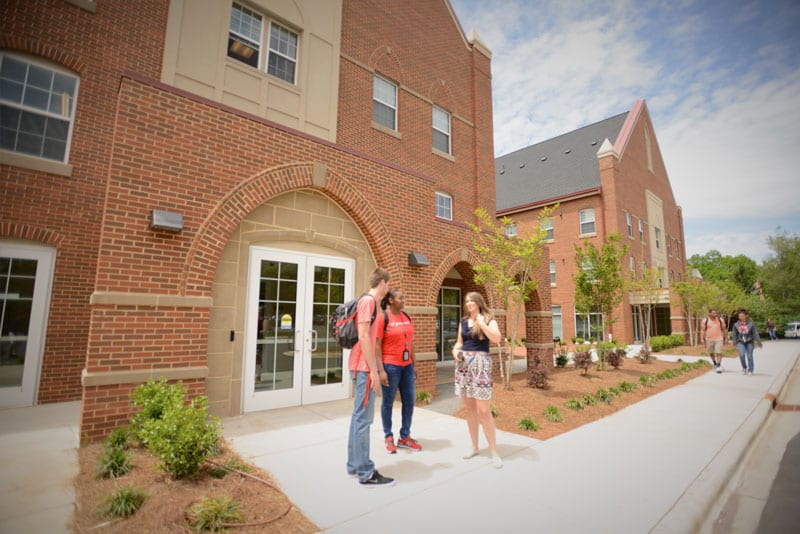 Students Outside a dorm on Belmont Abbey Campus