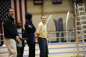 Jay Phillips (center) will coach Track & Field and Cross Country at Belmont Abbey College.