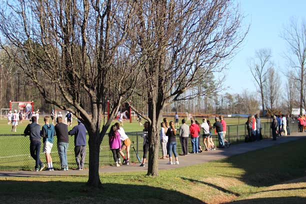 Since the new improvements to Alumni Field, everyone seems to have taken to fence watching!