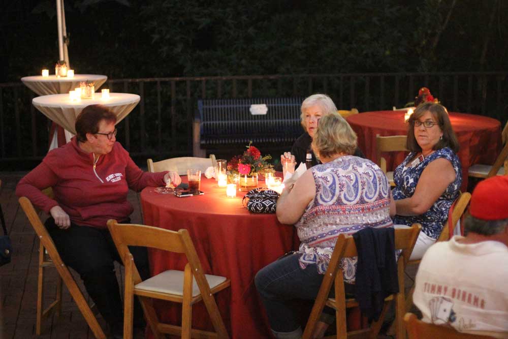 This year's specific class reunion was the class of 1981! Friends caught up among food, live music, and twinkly lights.