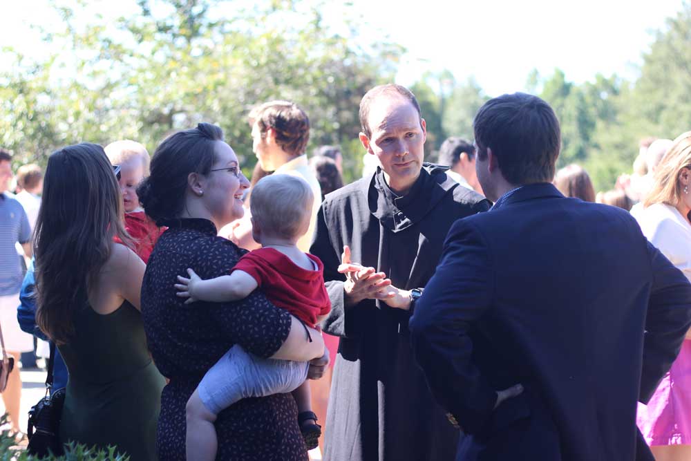 Brother Edward catching up with Alumni. The Mass of Remembrance thus concluded Homecoming festivities. Until next year Alumni, and hopefully, much sooner!