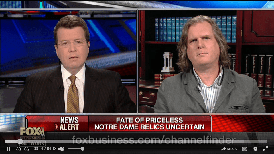 Dr. Feay speaking on the Notre Dame fire